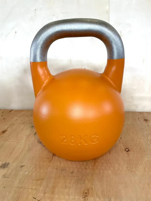Kettlebell Olímpica naranja de 28 kg para atletas de nivel avanzado.